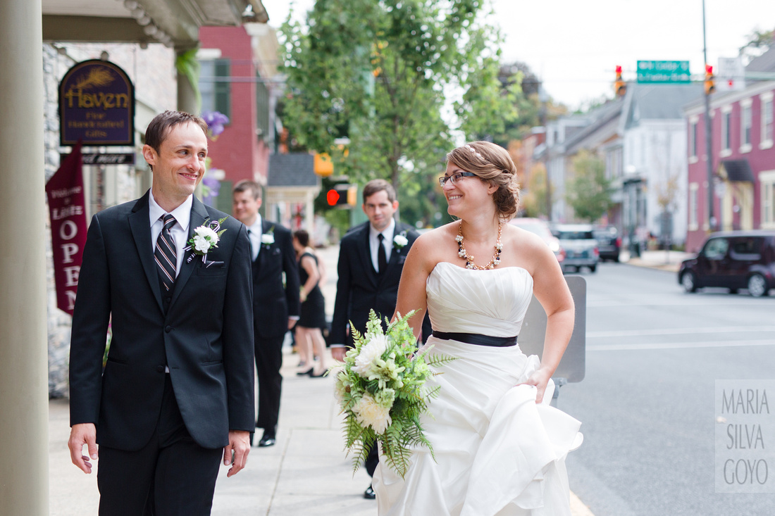 Bride and groom walking in Downtown Lititz