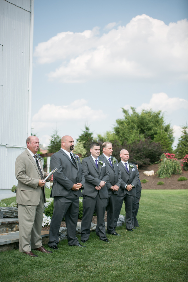 Groom and groomsmen during ceremony at Stoltzfus Homestead