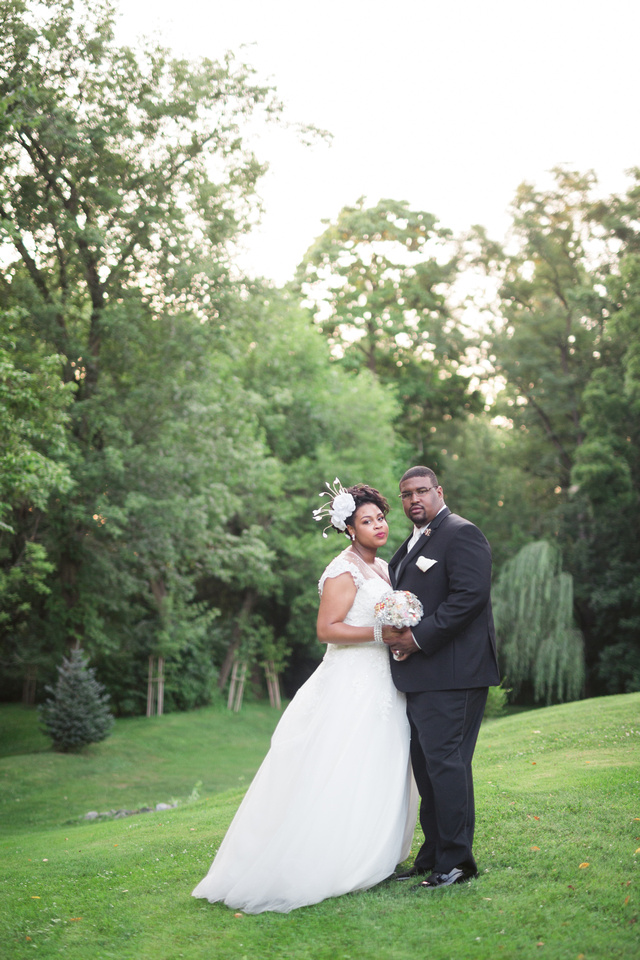 Bride and groom sunset portrait at Riverdale Manor