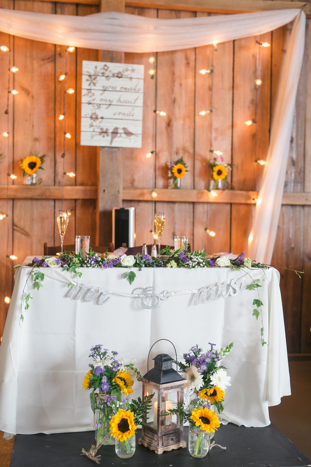 Sweetheart table with sunflowers at Stoltzfus Homestead
