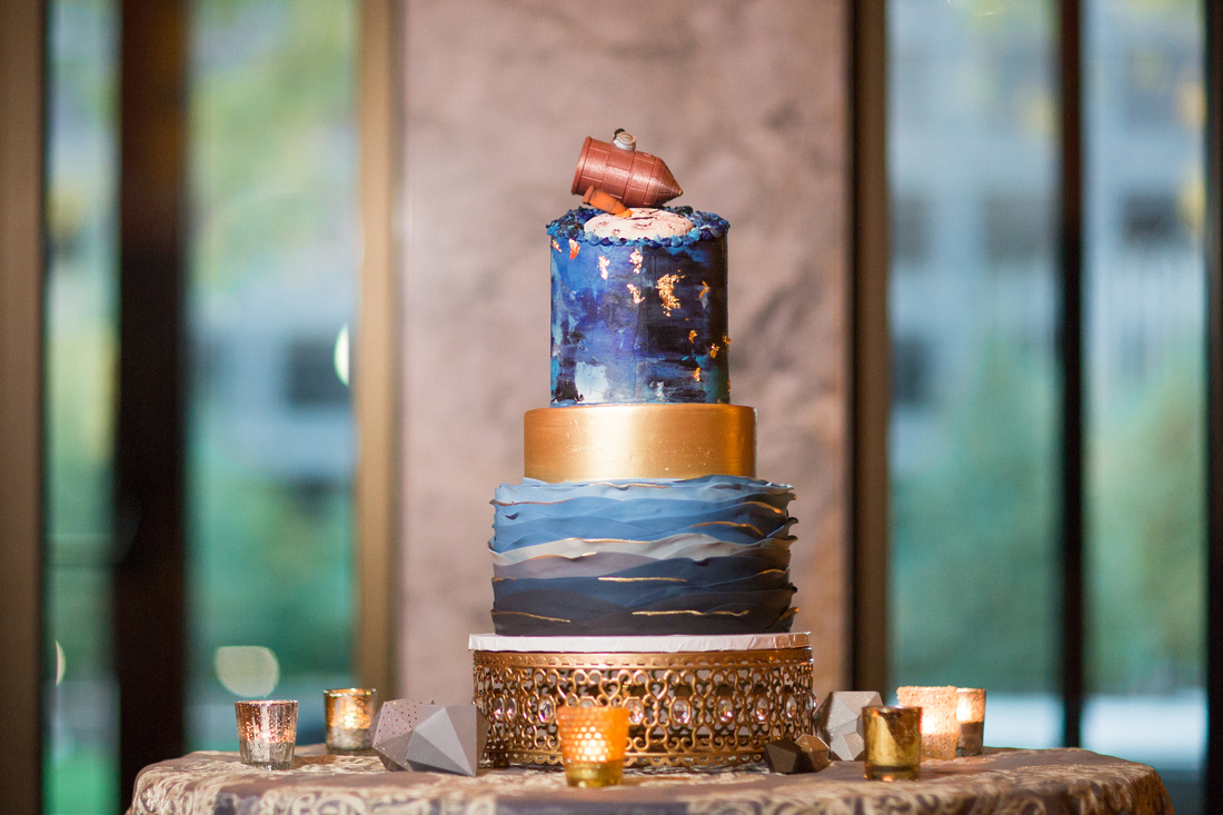 Beautifully cool trip to the moon wedding cake by Pittsburgh's Bella Christie & Lil’ Z’s Sweet Boutique