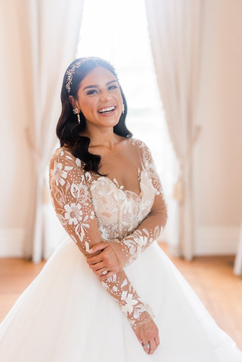 Bright backlit bridal portrait inside Brecknock Hall