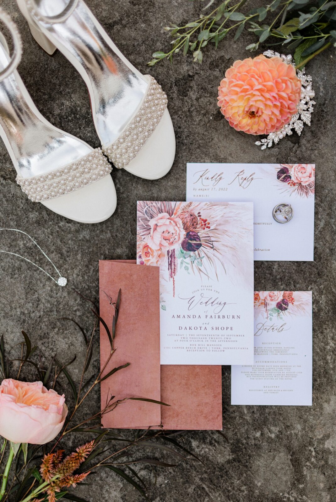 Invitation suite and other details in shades of coral by Maria Silva Goyo Photography at Box Hill Mansion