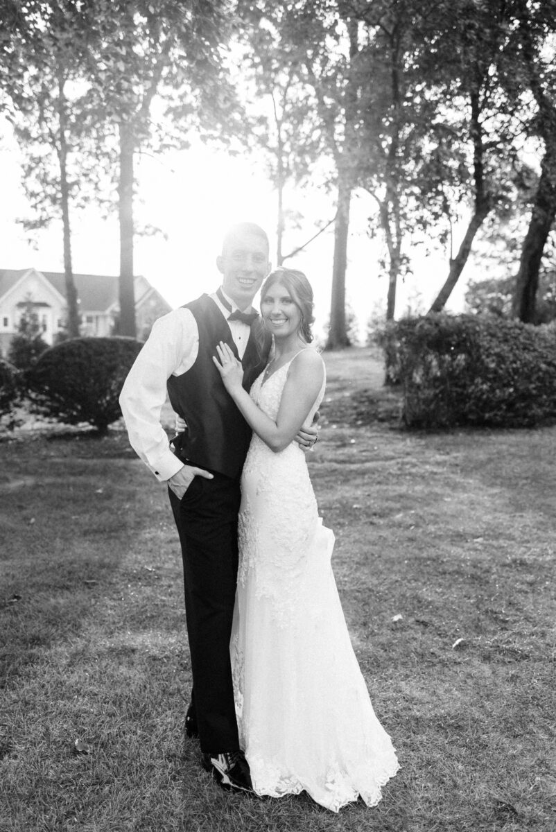 Black and white Sunset photo of bride and groom at Box Hill Mansion