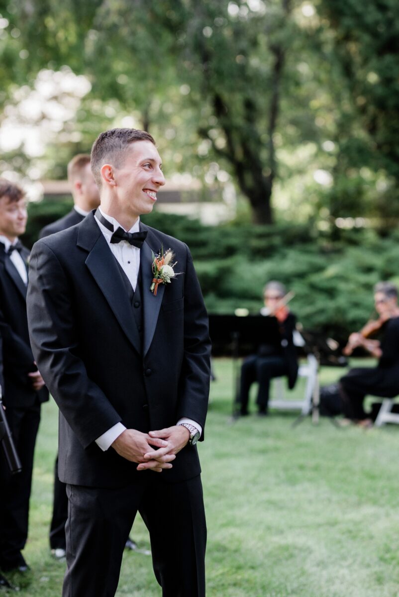 Groom seeing the bride for the first time at the beginning of the ceremony at Box Hill Mansion, photographed by Maria Silva-Goyo Photography